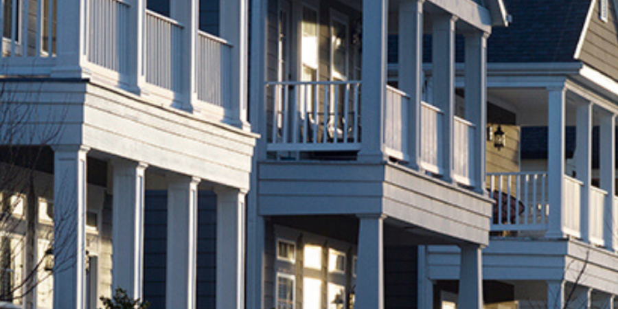 Row of houses with front porches.