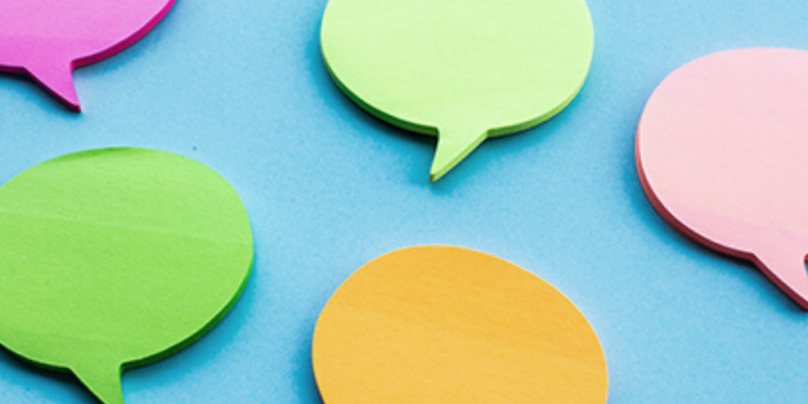 Colorful speech bubbles on blue background.