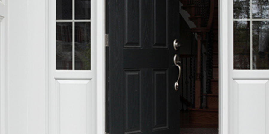 Open black front door to home.