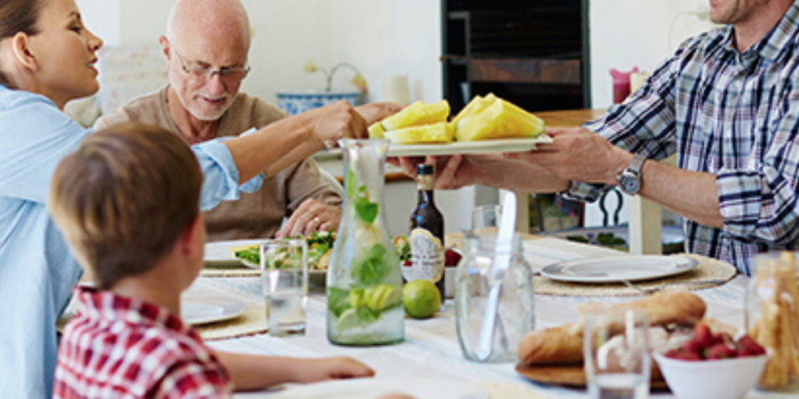 Family enjoying a meal together.