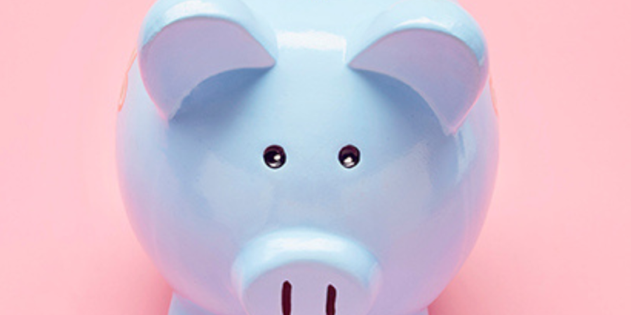 Here's an alt tag for the image: Blue piggy bank saving for a house.