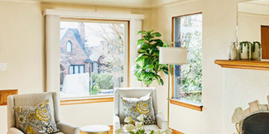 Bright living room with large window.