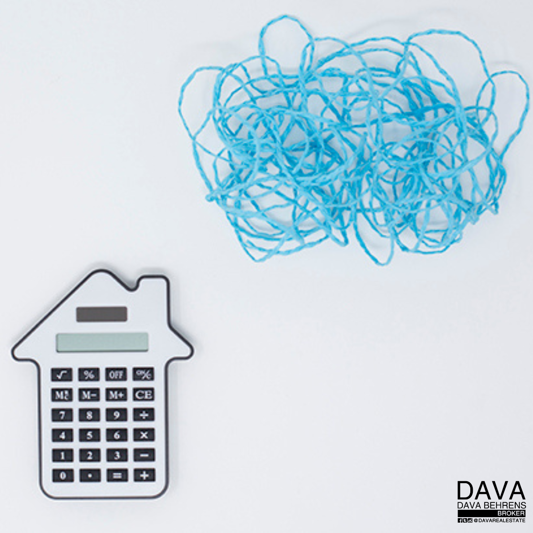 Here's an alt tag for the image: House-shaped calculator, tangled blue string.