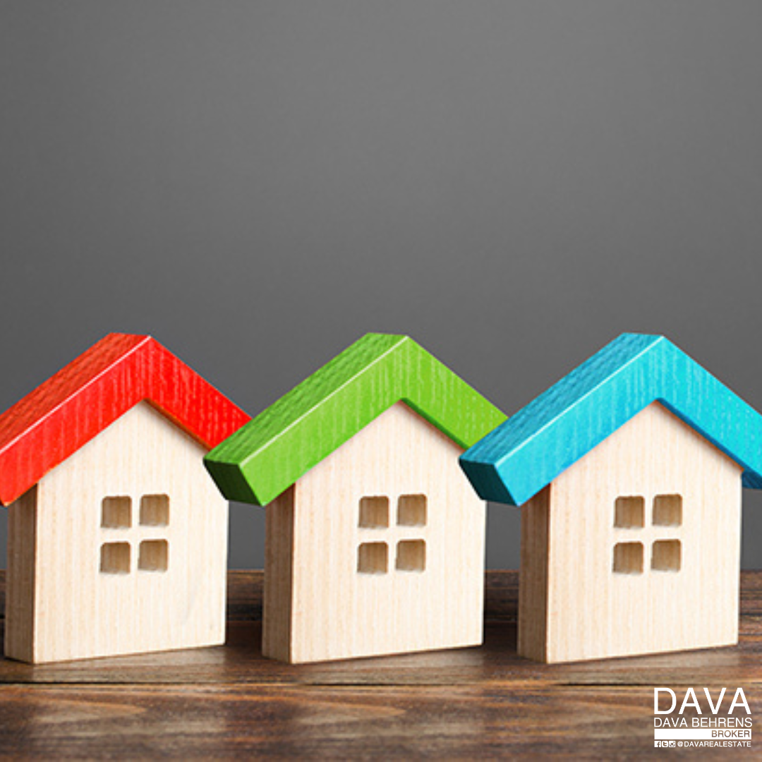 Three colorful houses in a row.