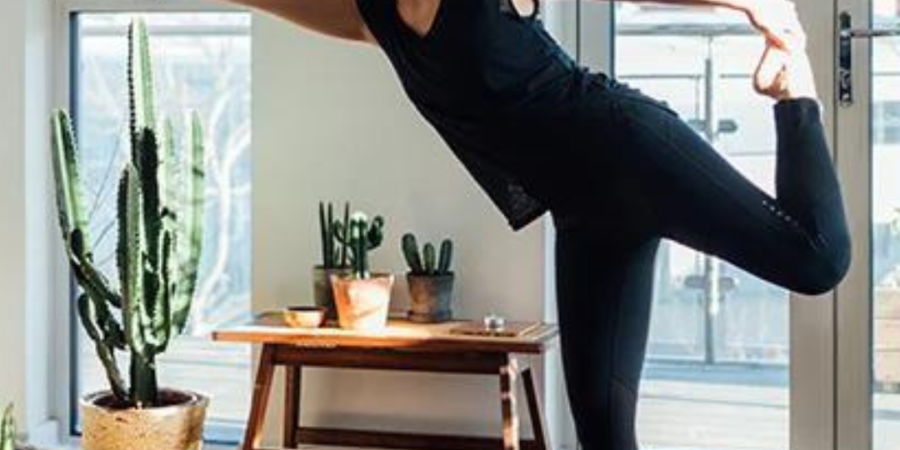 Woman stretching in yoga pose.