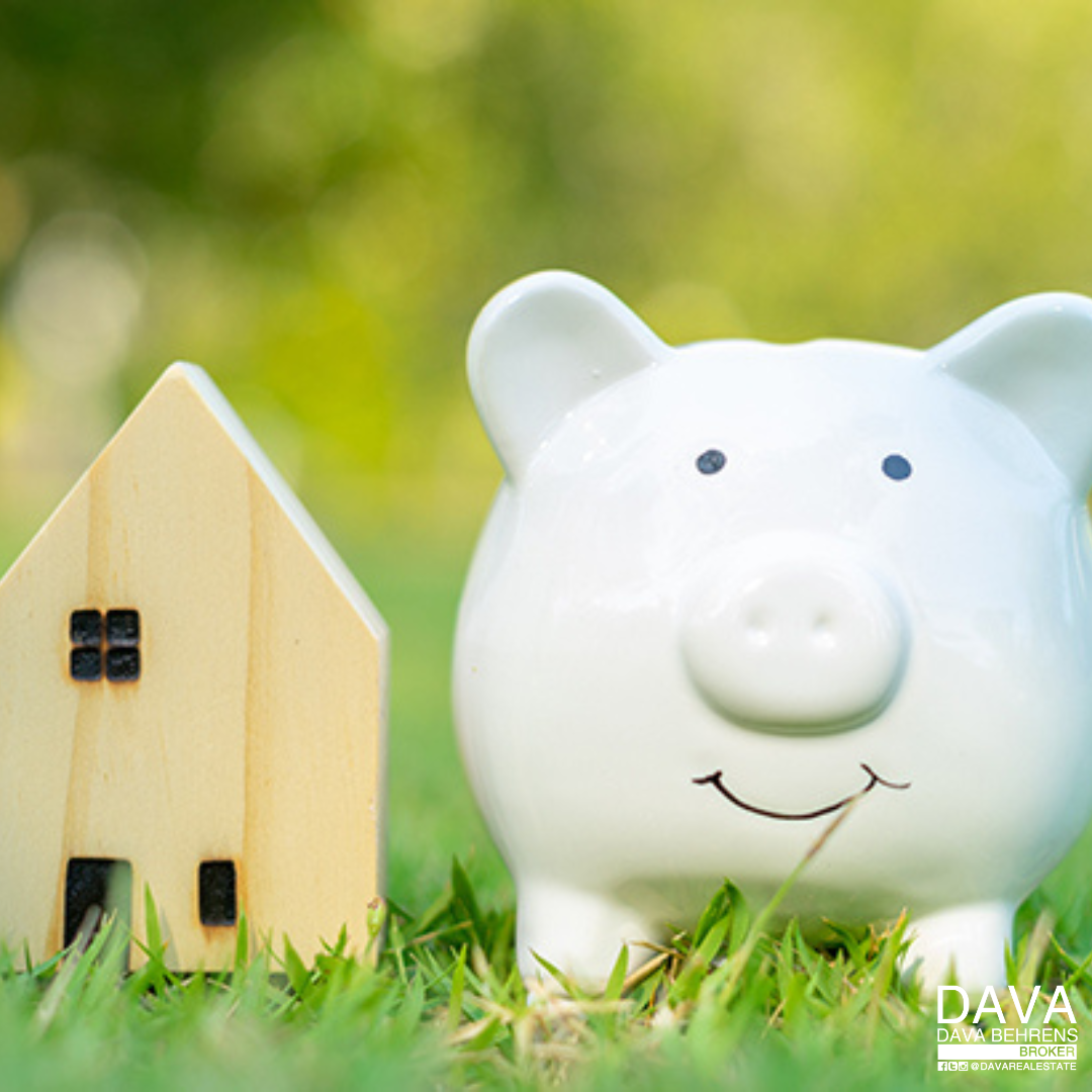 Piggy bank and house model saving for home.