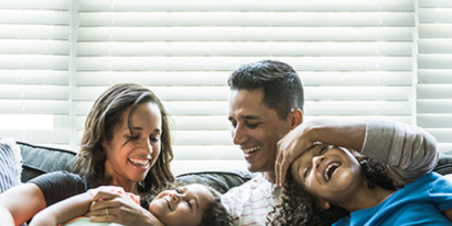 Happy family relaxing at home.