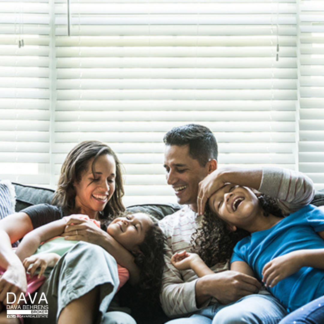 Happy family relaxing at home.