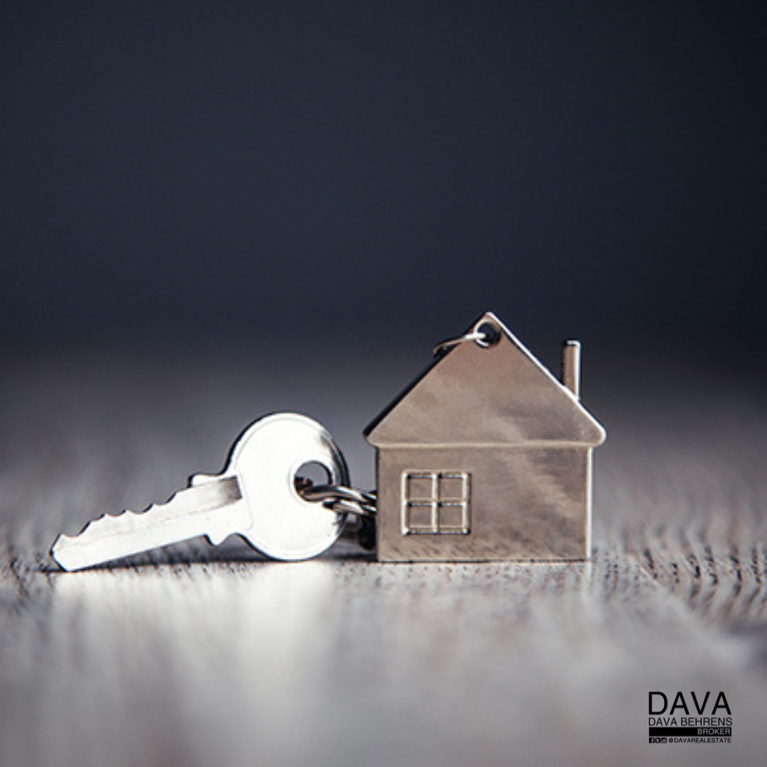 House key on wood table.