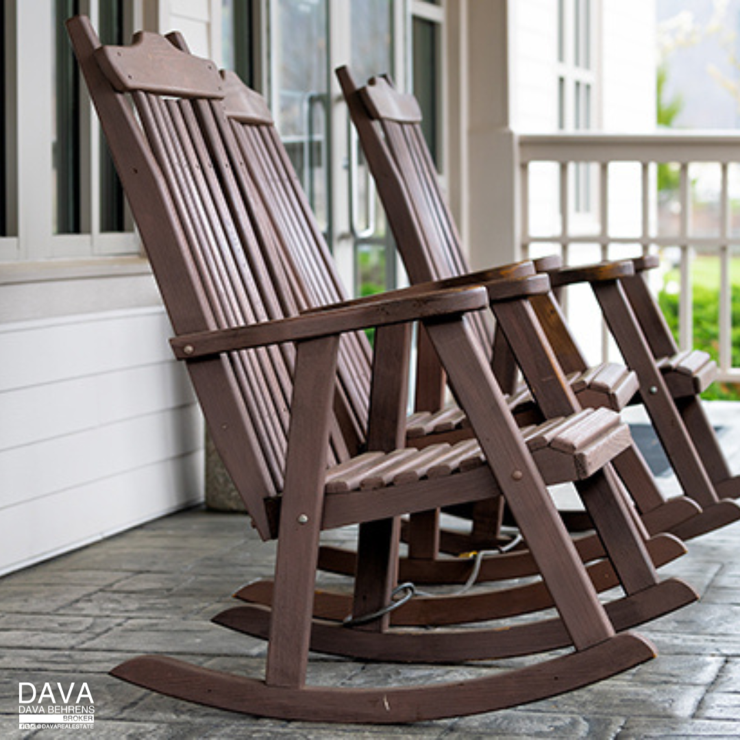 Brown rocking chairs on porch.