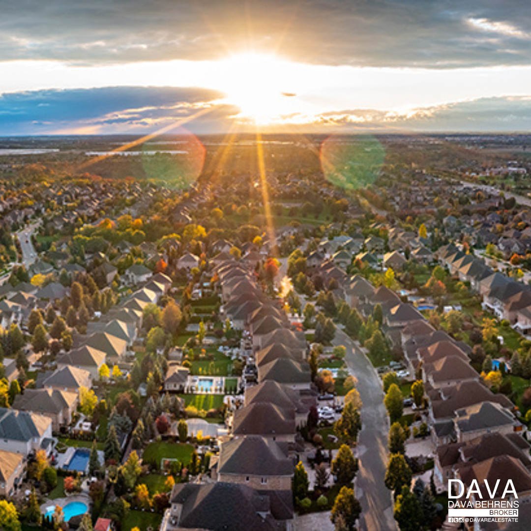 Sunset aerial view of suburban homes.