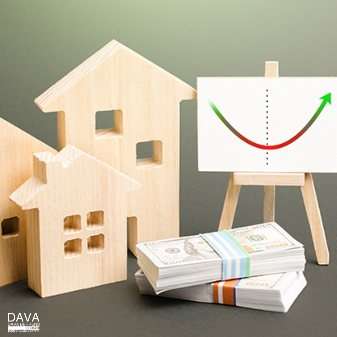 Rising housing market graph with cash.