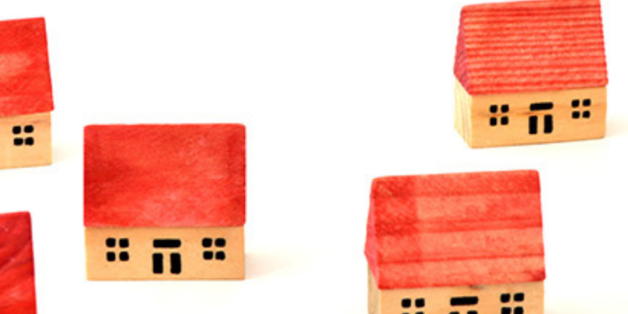 Miniature houses with red roofs.