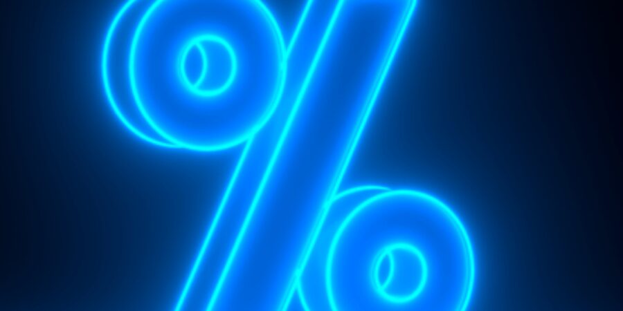 Blue neon percentage symbol on dark background.