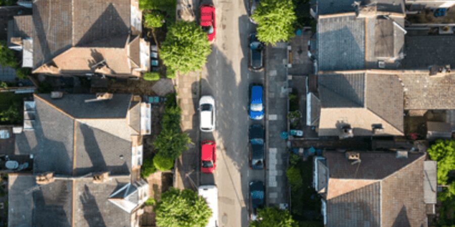 Aerial view of residential street and homes.