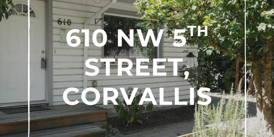 House with address in Corvallis, surrounded by greenery.